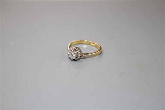 An 18ct and illusion set solitaire diamond ring,